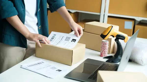 Putting label on box